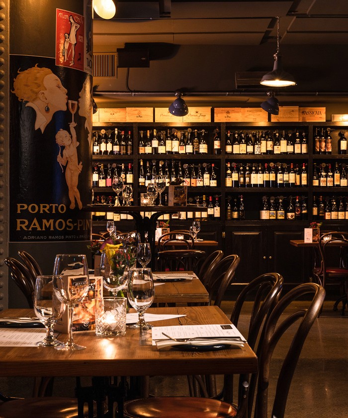 The Wine Cellar's candlelit tables and wine walls